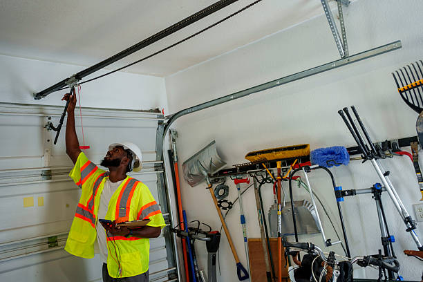 Professional Garage Door Panel Replacement technician working in Badger, AK
